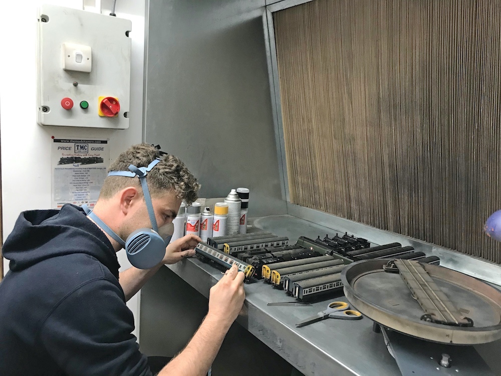 Technician Working on Batch of DMUs